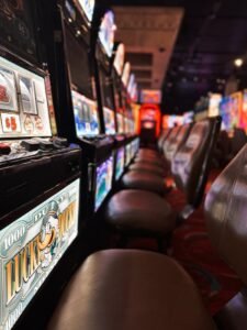 A row of slot machines in a casino